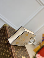 LV PETIT SAC PLAT CREME MONOGRAM EMPREINTE RINDSLEDER
