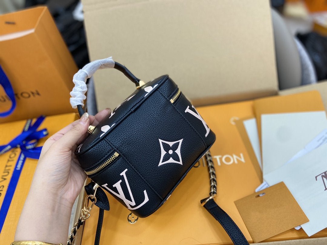 VANITY PM 19 CM SCHWARZ-WEISS MONOGRAMM EMPREINTE LEDER 