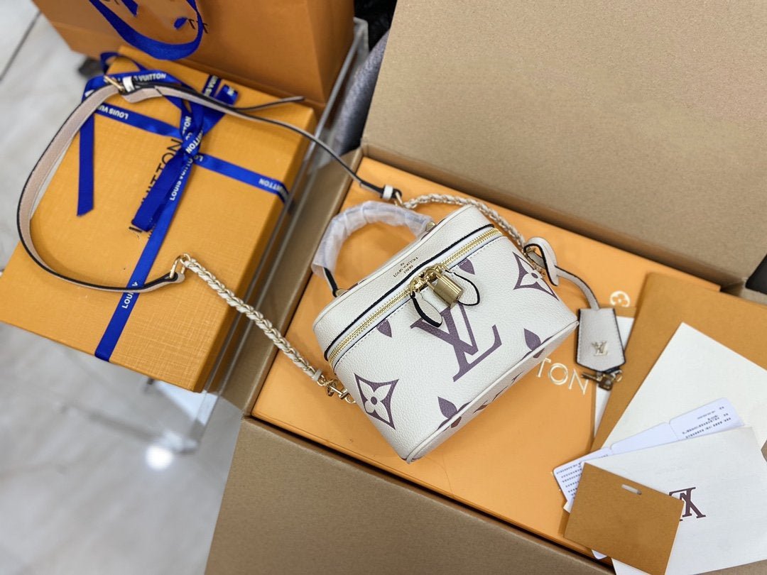 VANITY PM 19CM WEISS LILA MONOGRAMM CANVAS LEDER 