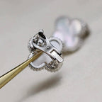 Jewelicorn Ohrringe mit Kleeblatt-Motiv, mittelgroß, weiß, silber