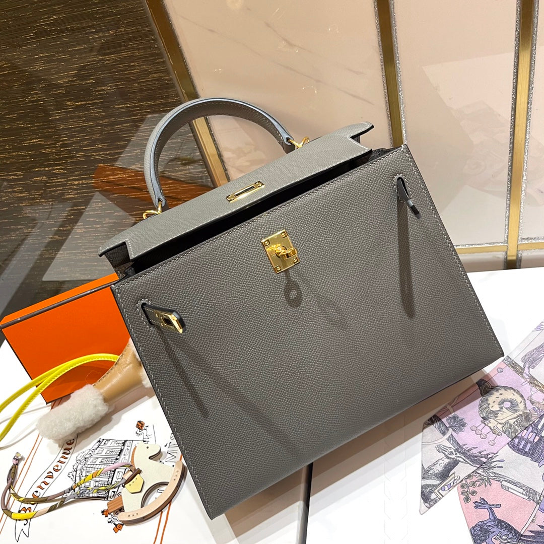 HM KELLY 25CM GRIS MOUETTE EPSOM LEDER GOLDENE BESCHLÄGE