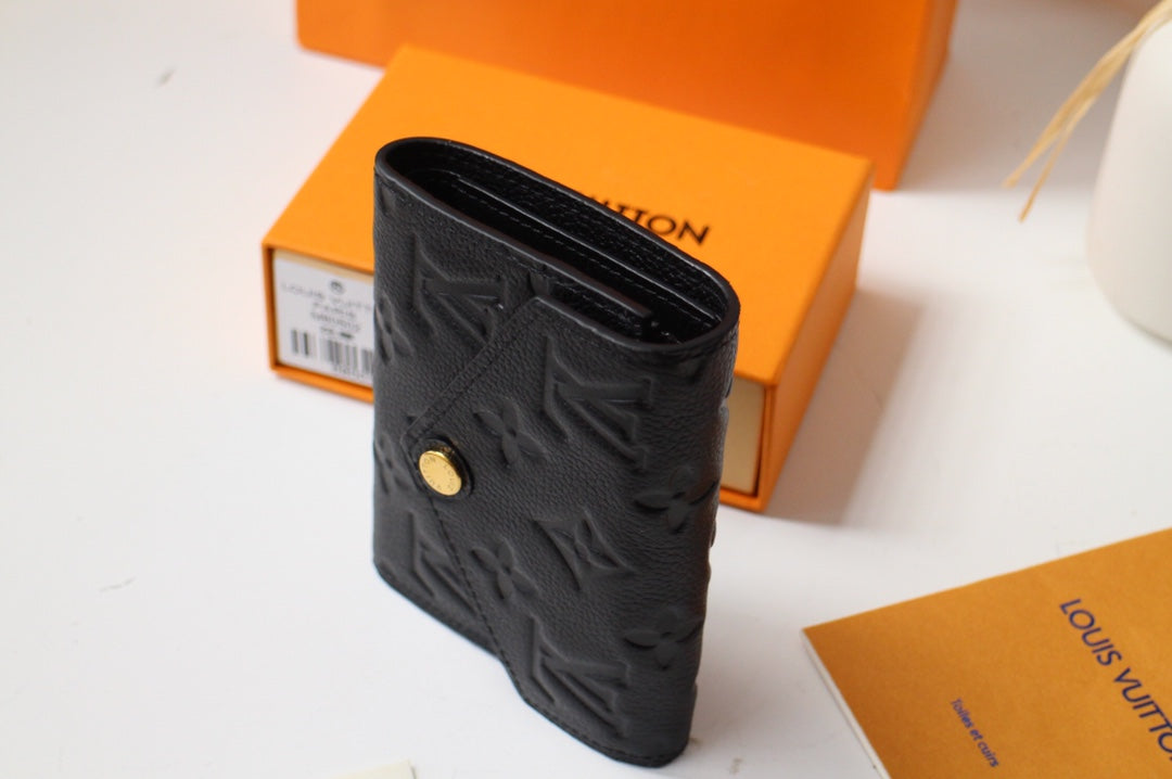 VICTORINE-BRIEFTASCHE 12 CM SCHWARZES MONOGRAMM-EMPREINTE-LEDER