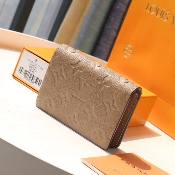 CLEA-BRIEFTASCHE 12 CM BEIGES MONOGRAMM-EMPREINTE-LEDER