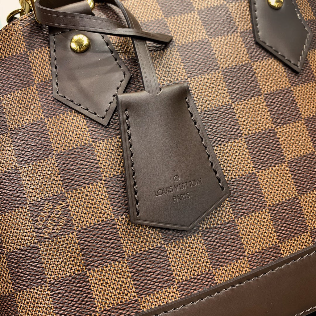 GEFLOCHTENE ALMA BB 23 IN BRAUNER DAMIER EBENE CANVAS-GOLDSCHNALLE