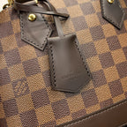 GEFLOCHTENE ALMA BB 23 IN BRAUNER DAMIER EBENE CANVAS-GOLDSCHNALLE