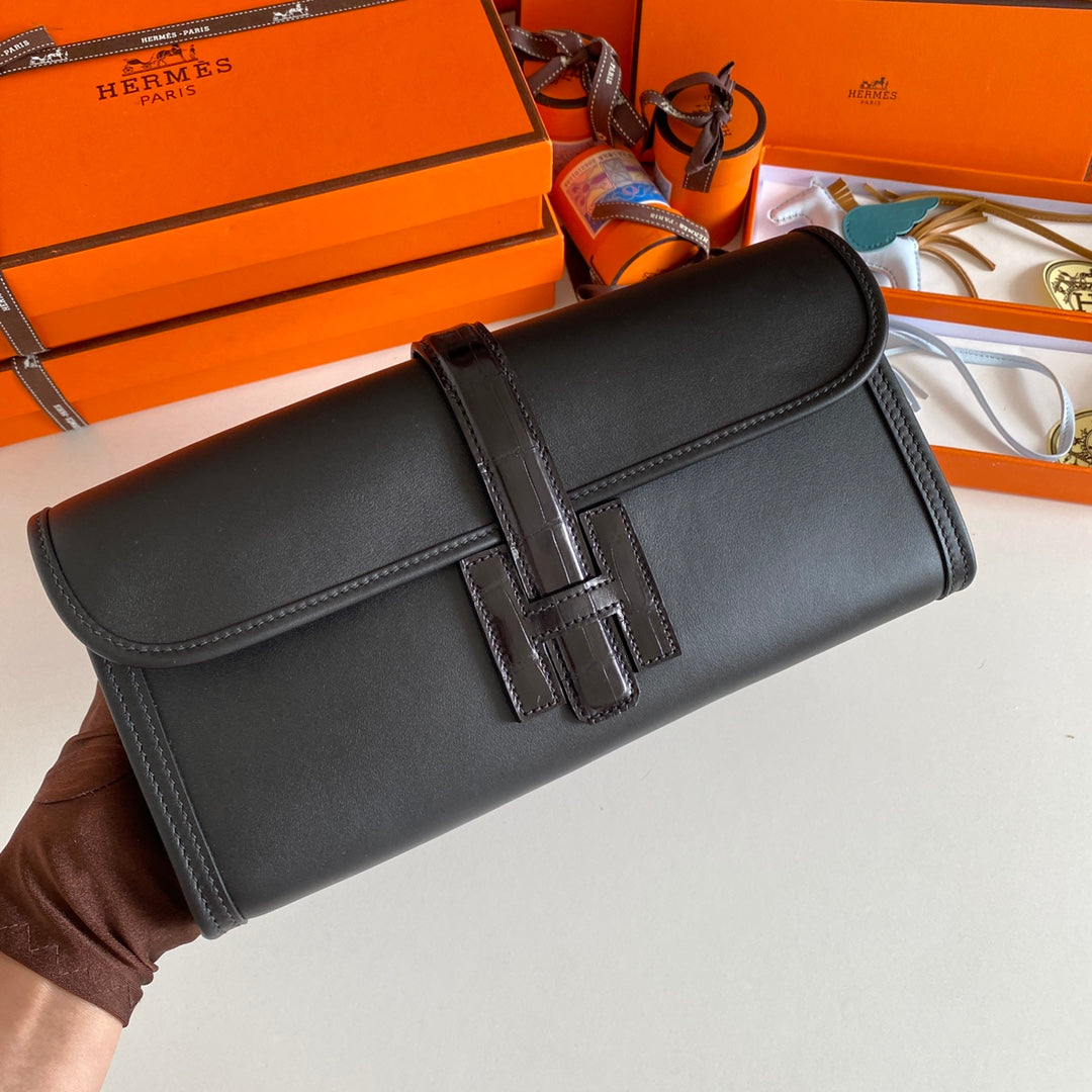 JIGE ELAN 29 Clutch aus schwarzem Kalbsleder mit Eidechsenleder (auf Bestellung gefertigt)