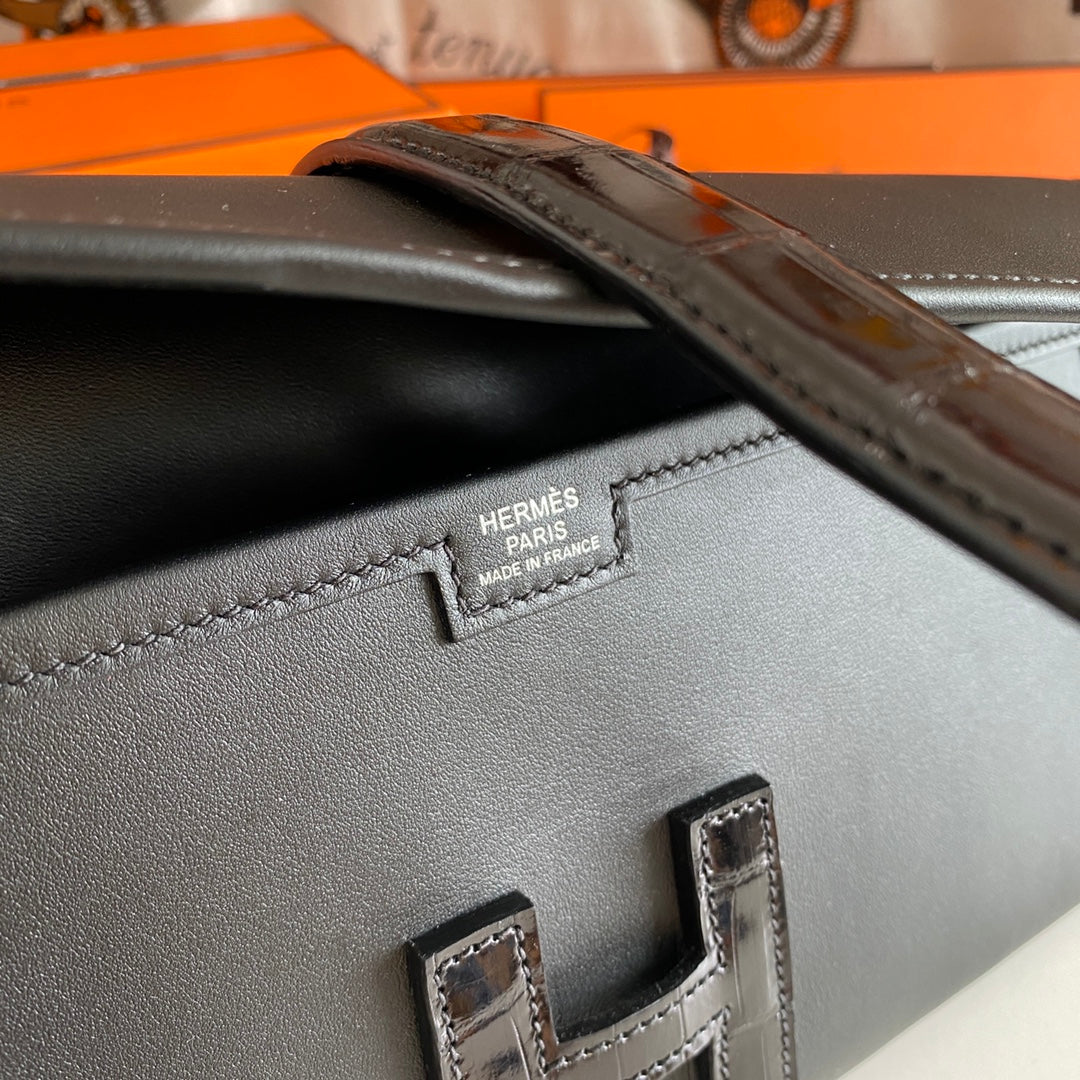 JIGE ELAN 29 Clutch aus schwarzem Kalbsleder mit Eidechsenleder (auf Bestellung gefertigt)