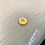 KATE TASSEL 24 CROCODILE PATTERN CALFSKIN WHITE WITH GOLD LOGO