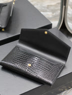 UPTOWN WALLET 21 IN BLACK CROCODILE PATTERN CALFSKIN GOLD LOGO