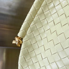 MEDIUM SOLSTICE 44 DUNKLES CREME LAMMFELL