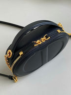 SIGNATURE 18 OVAL TASCHE AUS SCHWARZEM KALBSLEDER