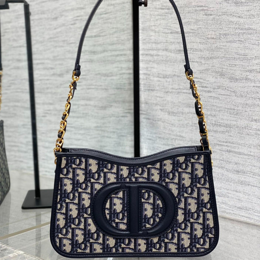 HOBO SIGNATURE 23 TASCHE IN SCHWARZ-BEIGE GEMUSTERTEM LAMMLEDER