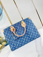 ONTHEGO 35 IN BLAUEM MONOGRAMM-DENIM