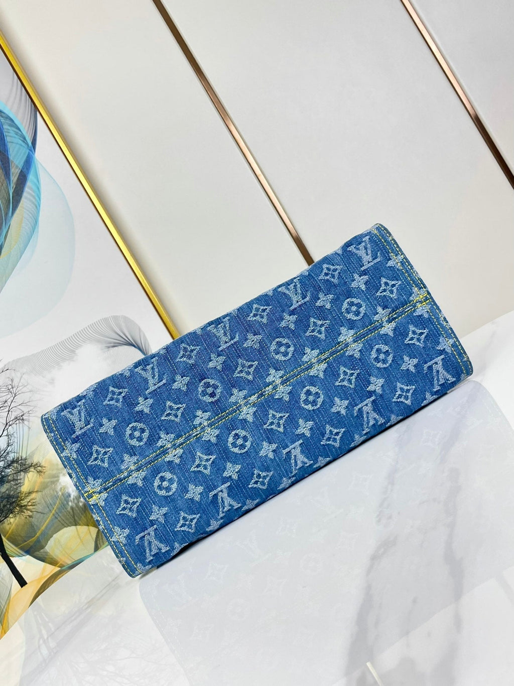 ONTHEGO 35 IN BLAUEM MONOGRAMM-DENIM