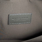 CLUTCH 26 INTRECCIATO AUS KORDGRAUEM KALBSLEDER