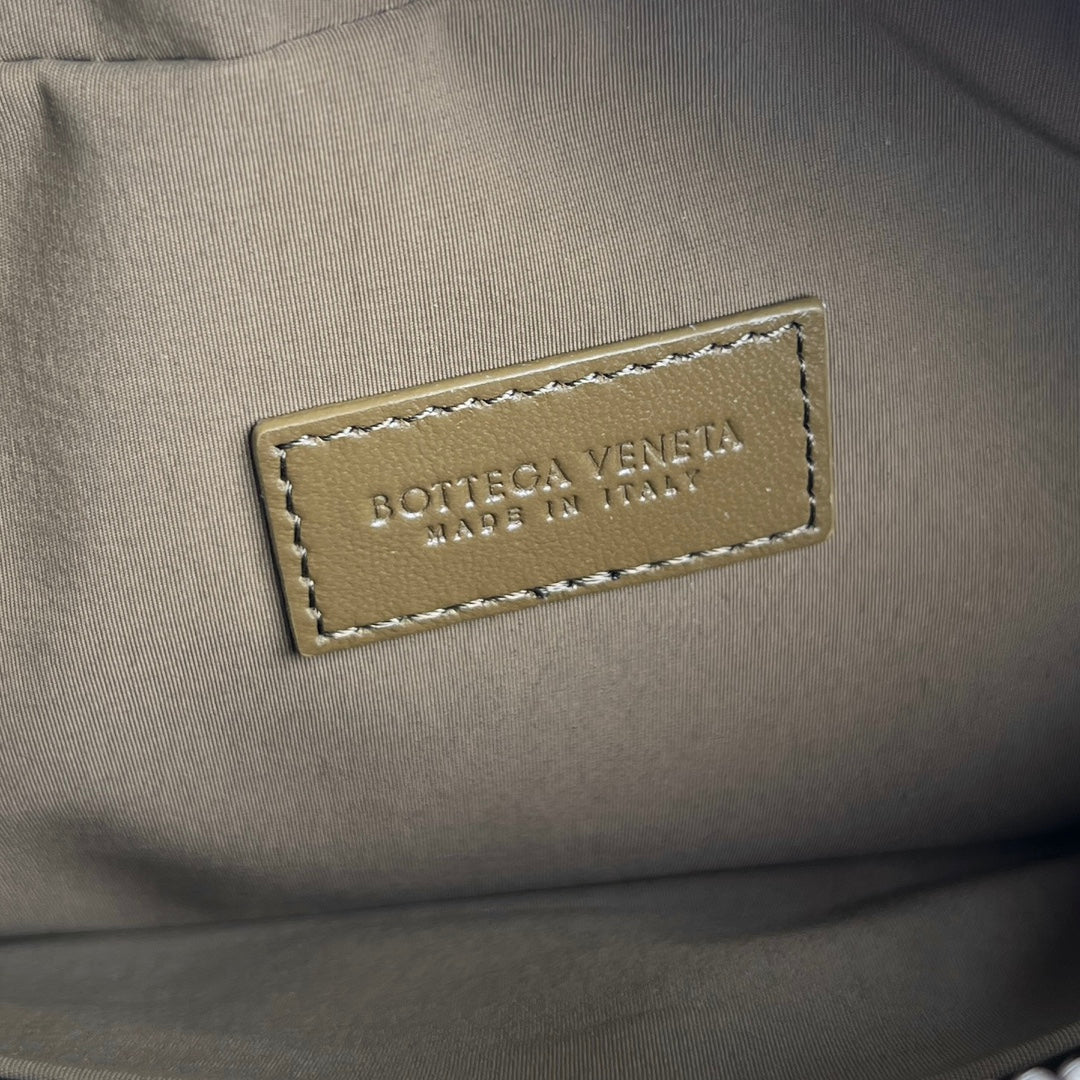 CLUTCH 26 INTRECCIATO AUS GERSTEMAIS-KALBSKIN