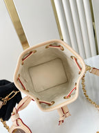 NANO NOÉ 16 IN WEISSEM MONOGRAMM-JACQUARD-STOFF UND BEIGEM KALBSLEDERBESETZ