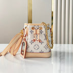 NANO NOÉ 16 IN WEISSEM MONOGRAMM-JACQUARD-STOFF UND BEIGEM KALBSLEDERBESETZ