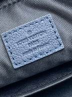 TRIO MESSENGER 25 IN PRUSSIAN BLUE MONOGRAM SHADOW CALFSKIN