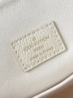 BACKUP-RUCKSACK 22 ZOLL CREME MONOGRAMM EMPREINTE LEDER