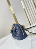 NANO ALMA 18 IN MARINEBLAU GESTEPPTES LAMMLEDER GOLDENE BESCHLÄGE