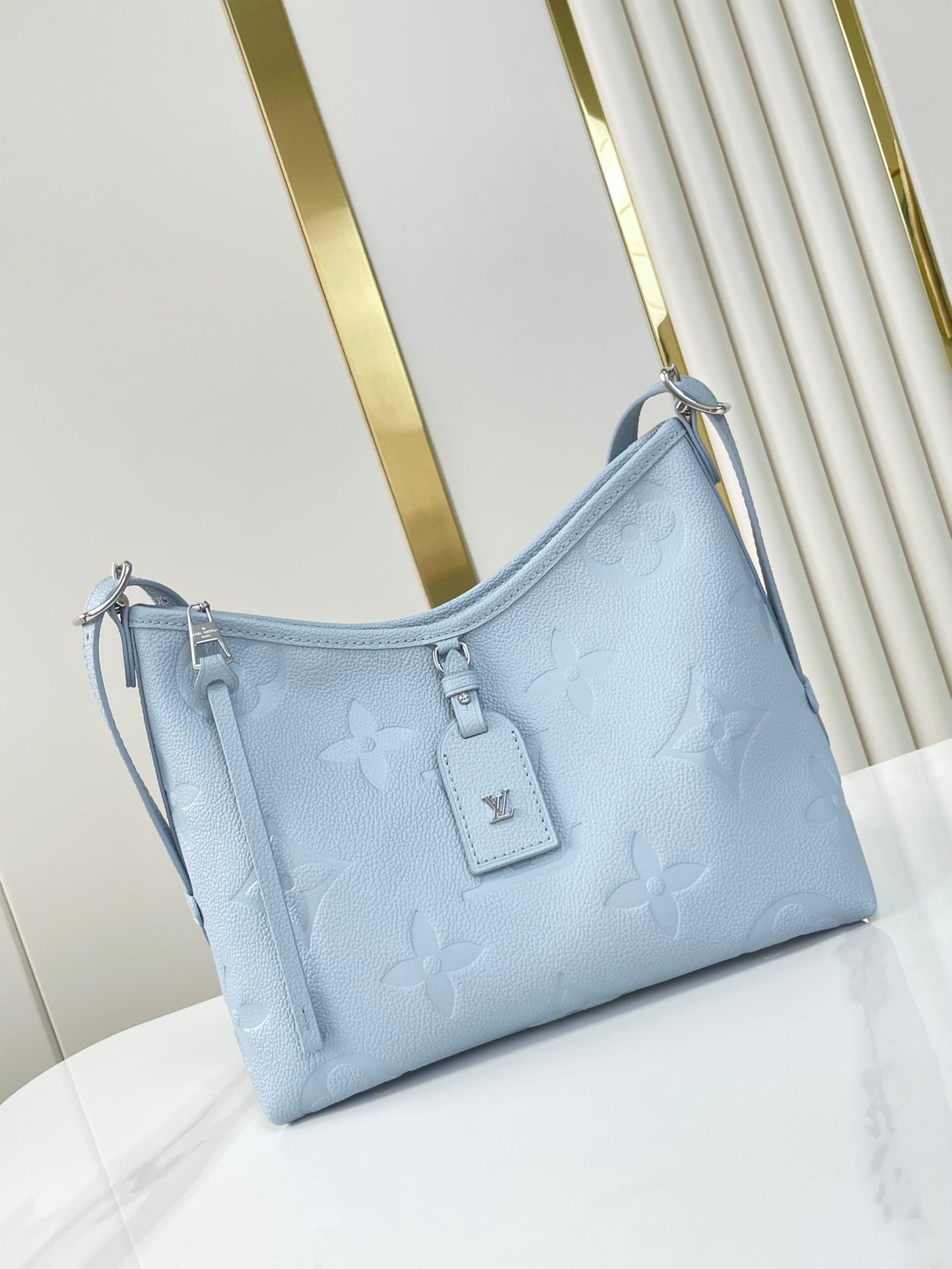 CARRYALL PM 29 AUS BEAU-BLAUEM MONOGRAM-EMPREINTE-LEDER