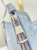 CARRYALL PM 29 AUS BEAU-BLAUEM MONOGRAM-EMPREINTE-LEDER