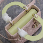 MITTLERE DAMENTASCHE 20 IN BABYROSA GESTEPPTES MAKROCANNAGE-KALBLEDER MIT SUMPFGELBEM TRAGERIEMEN