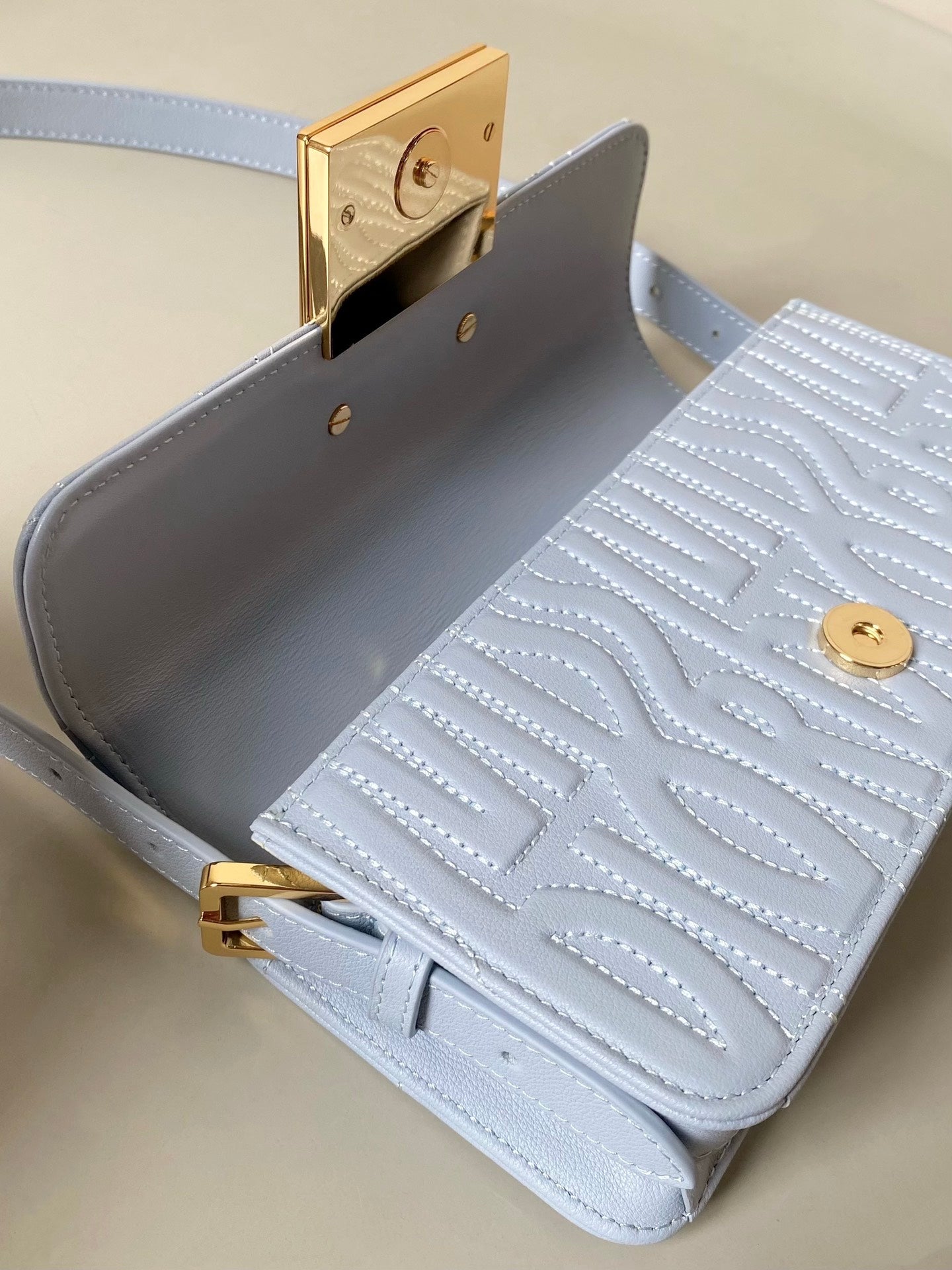 MEDIUM FLAP BAG 22 IN BABY BLUE QUILTED ALLOVER CALFSKIN