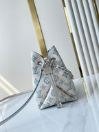 BELLA 22 IN WHITE PERFORATED CALFSKIN SILVER HARDWARE