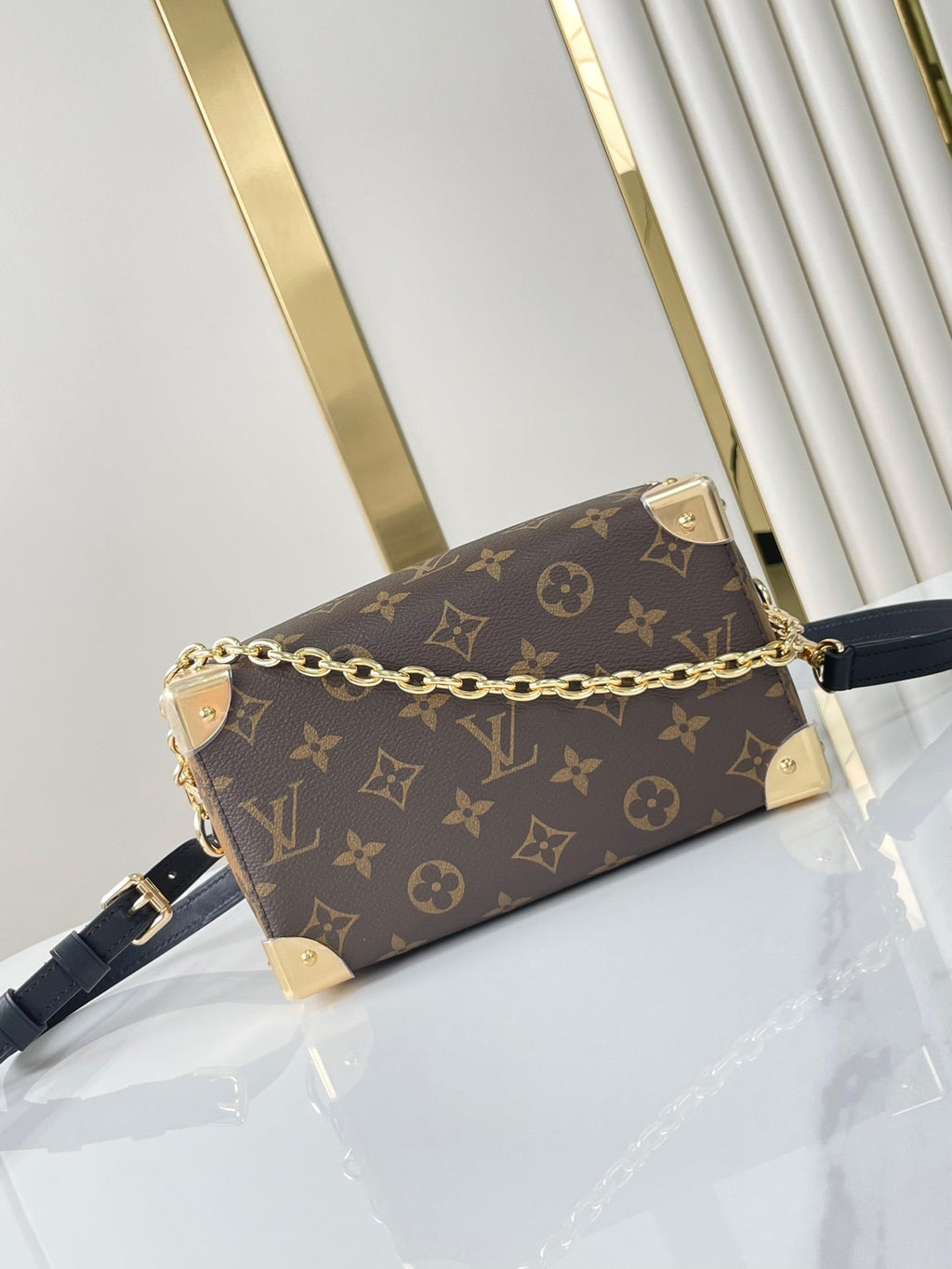 SPEEDY TRUNK 20 IN BRAUNEM MONOGRAMM-CANVAS UND SCHWARZEM KALBSLEDERBESATZ GOLDENE SCHNALLE