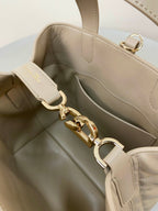 MEDIUM TOUJOURS BUCKET BAG 22 IN BEIGE CANNAGE CALFSKIN
