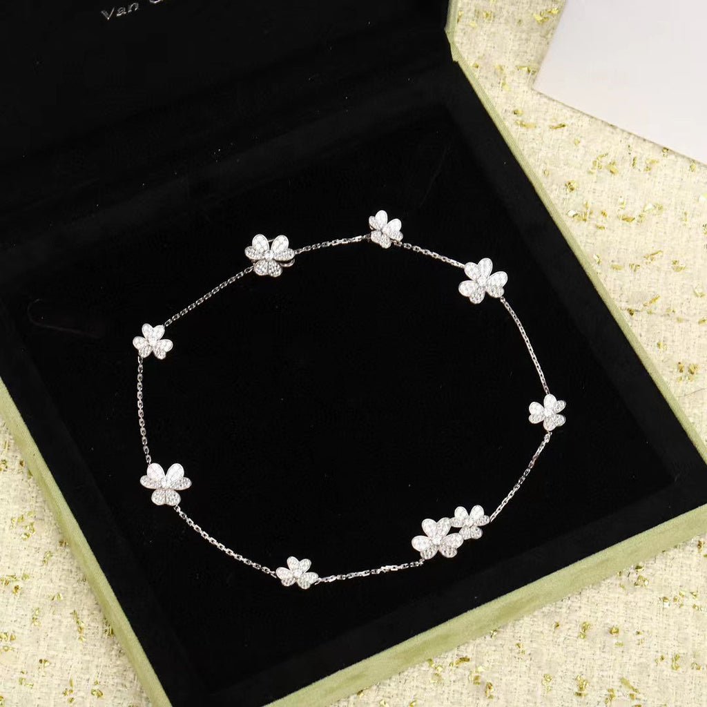 ¡®Jewelicorn¡¯FRIVOLE SILBERNE 9-BLUMEN-KETTE