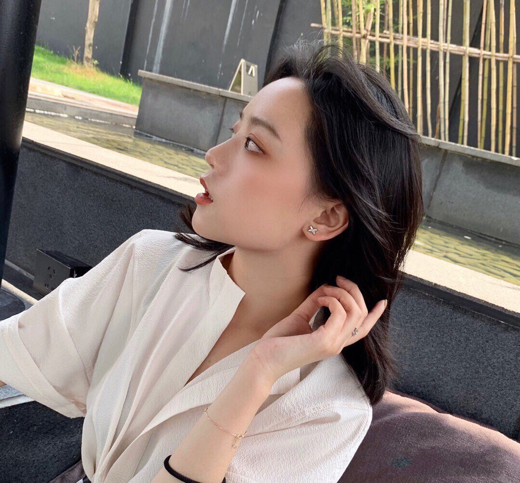 Jewelicorn Ohrringe aus weißem Perlmutt und Roségold mit Diamanten