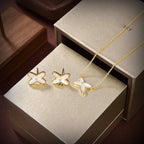 Jewelicorn Ohrringe aus weißem Perlmutt und Gold mit Diamanten