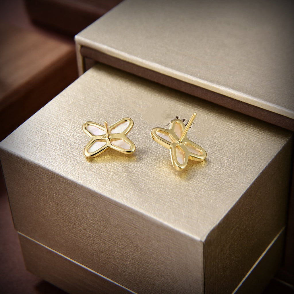 Jewelicorn Ohrringe aus weißem Perlmutt und Gold mit Diamanten