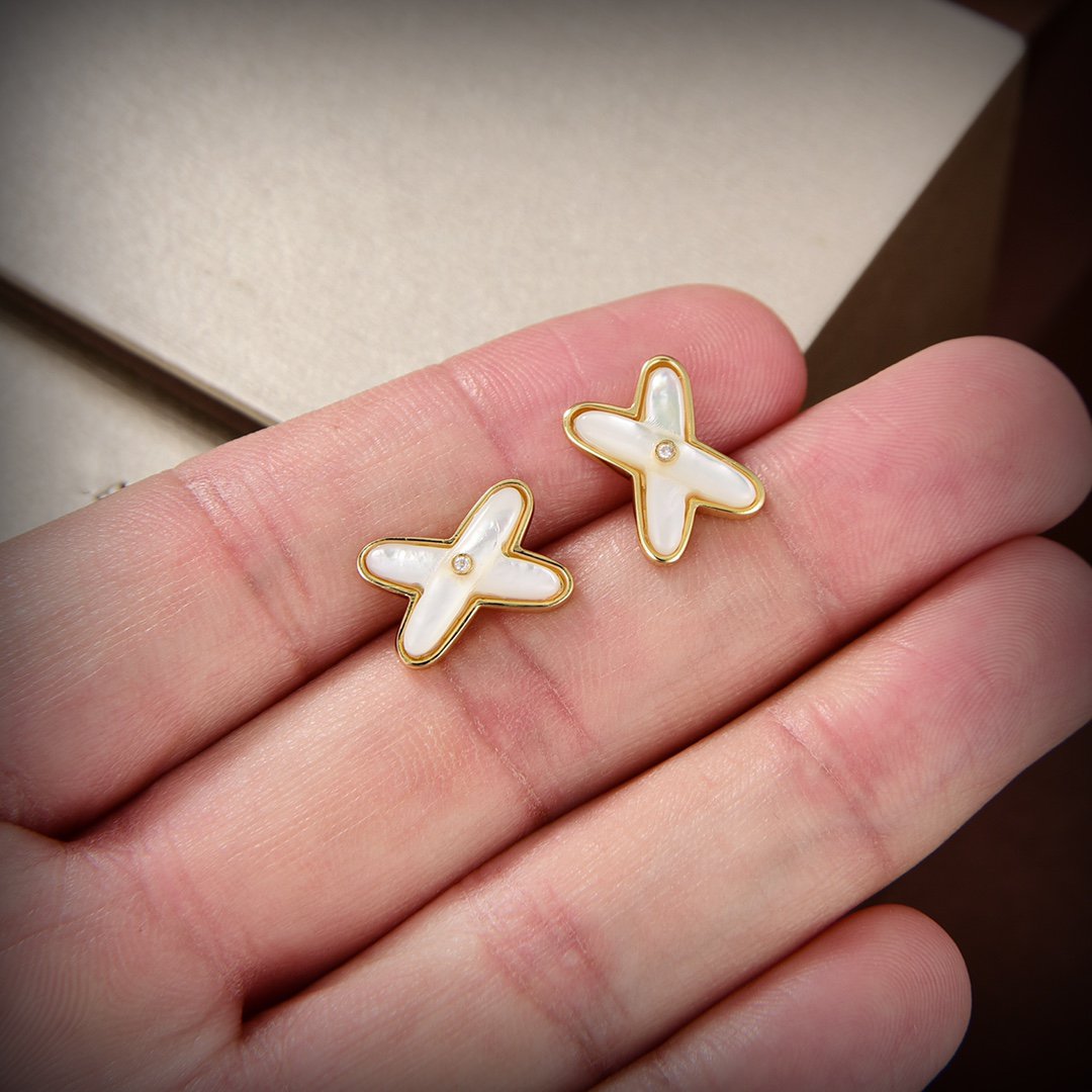 Jewelicorn Ohrringe aus weißem Perlmutt und Gold mit Diamanten