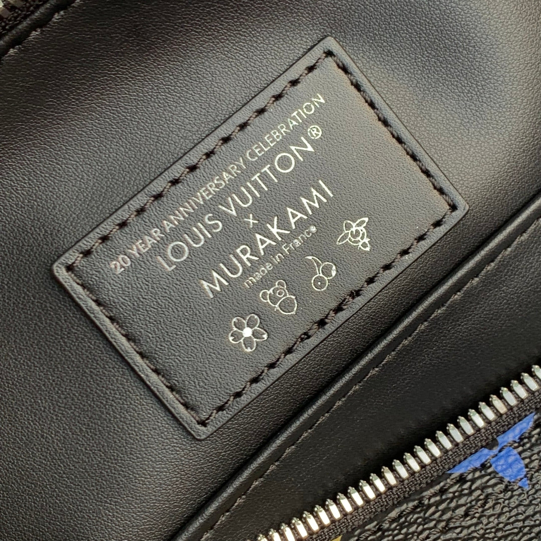 SPEEDY SOFT 30 IN COLORFUL MONOGRAM PATTERN AND BLACK COATED CANVAS