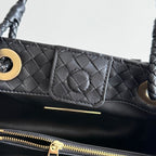 BOTTEGA VENETA 25S BASKET BAG 31 IN BLACK CALFSKIN GOLD HARDWARE