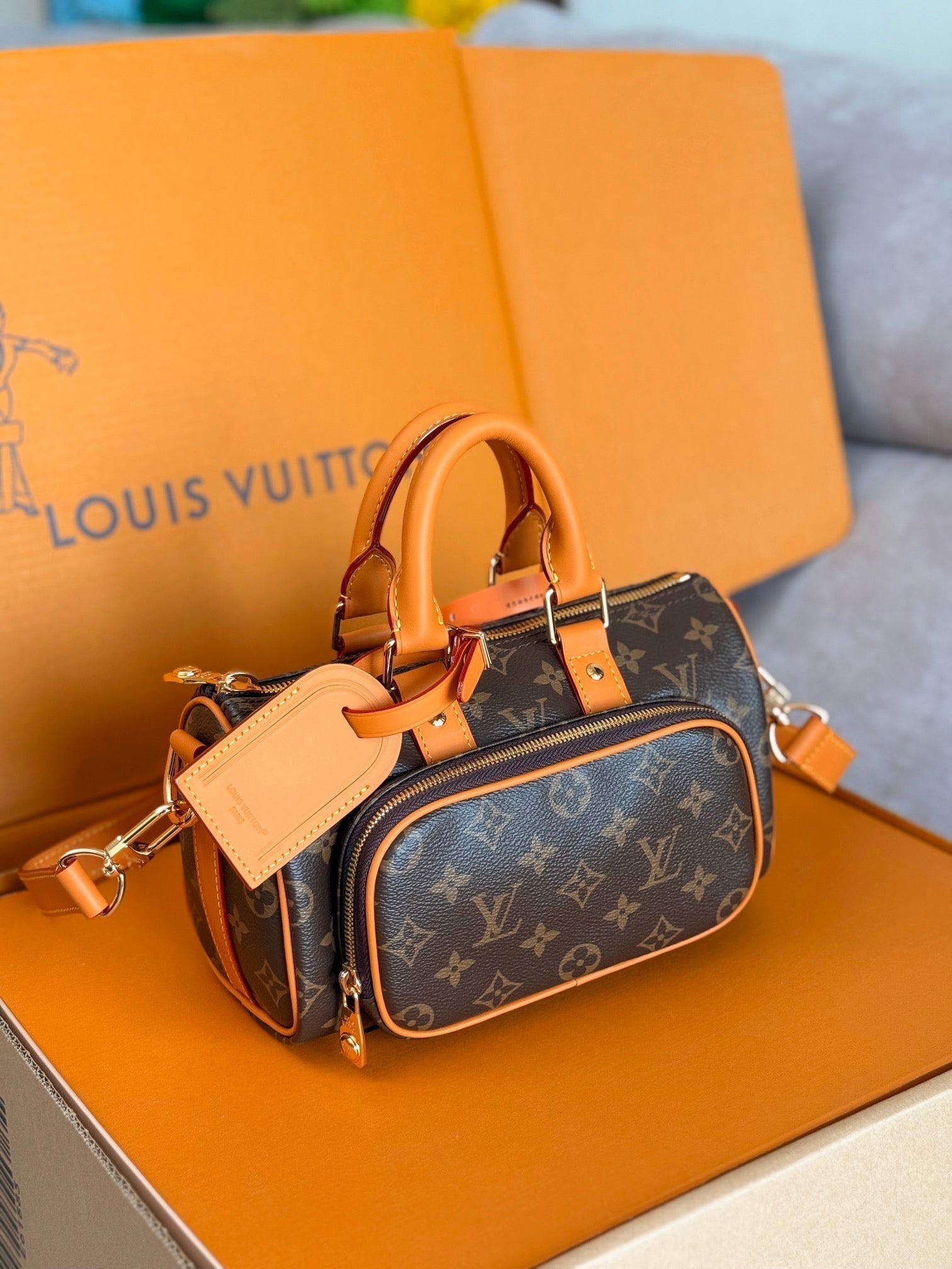 LV 25S KEEPALL CARGO 25 IN BROWN MONOGRAM CANVAS AND CALFSKIN GOLD HARDWARE