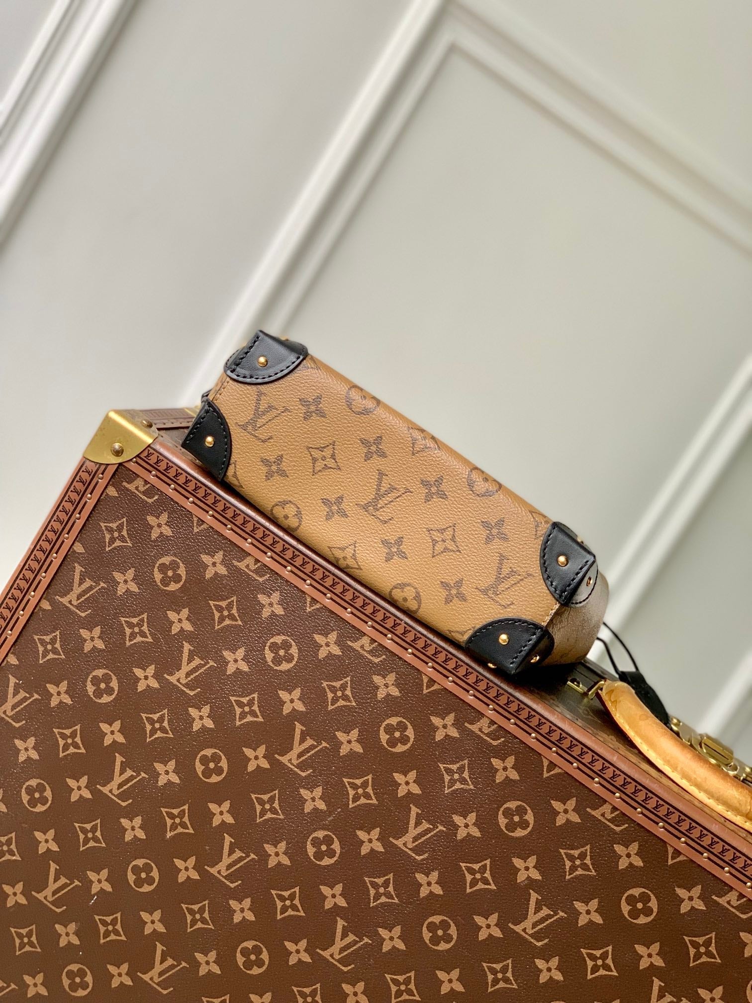 NOÉ TRUNK 23 IN BRAUN MONOGRAM REVERSE CANVAS GOLDENE HARDWARE