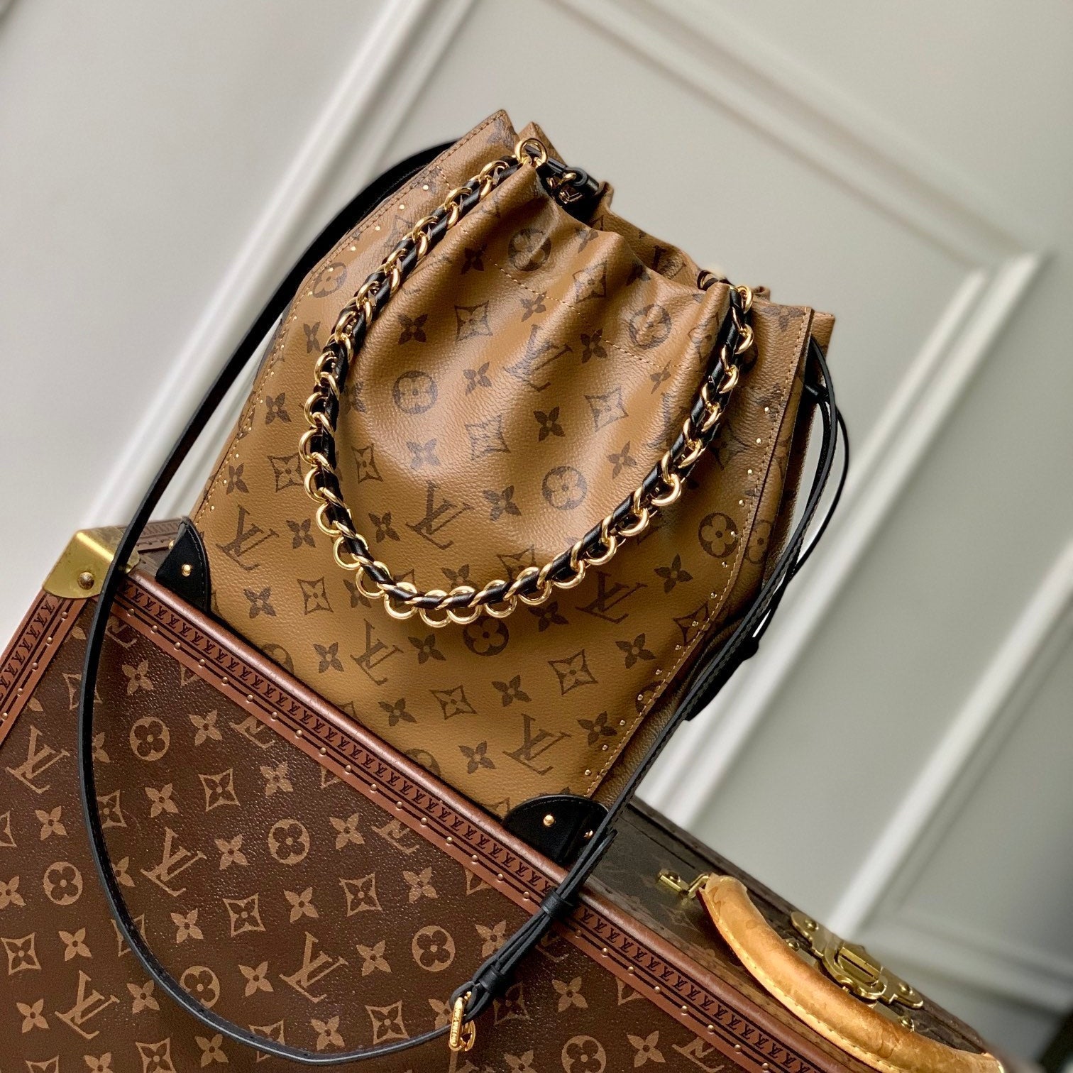 NOÉ TRUNK 23 IN BRAUN MONOGRAM REVERSE CANVAS GOLDENE HARDWARE