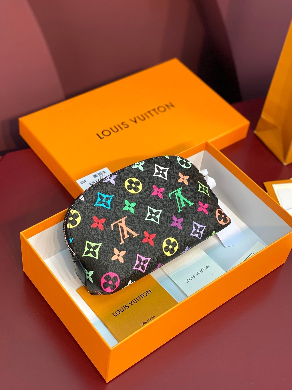 Kosmetiktasche PM 19 aus farbenfrohem Monogramm-Canvas