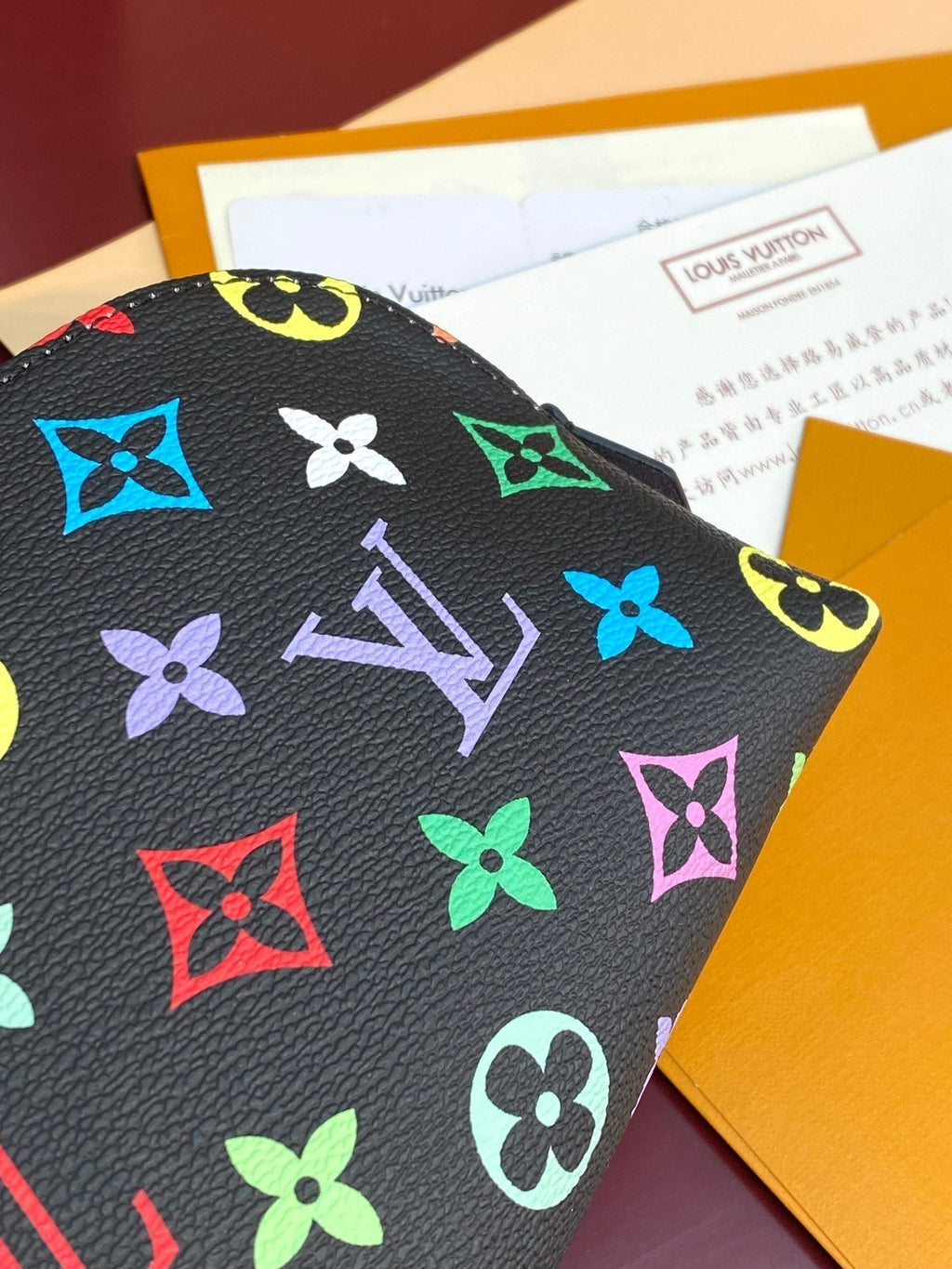 Kosmetiktasche PM 19 aus farbenfrohem Monogramm-Canvas