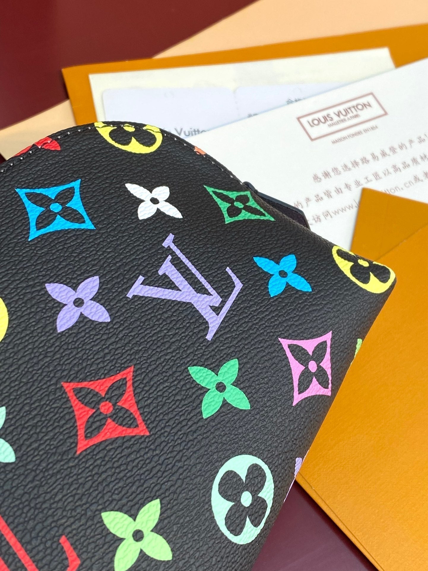 Kosmetiktasche PM 19 aus farbenfrohem Monogramm-Canvas