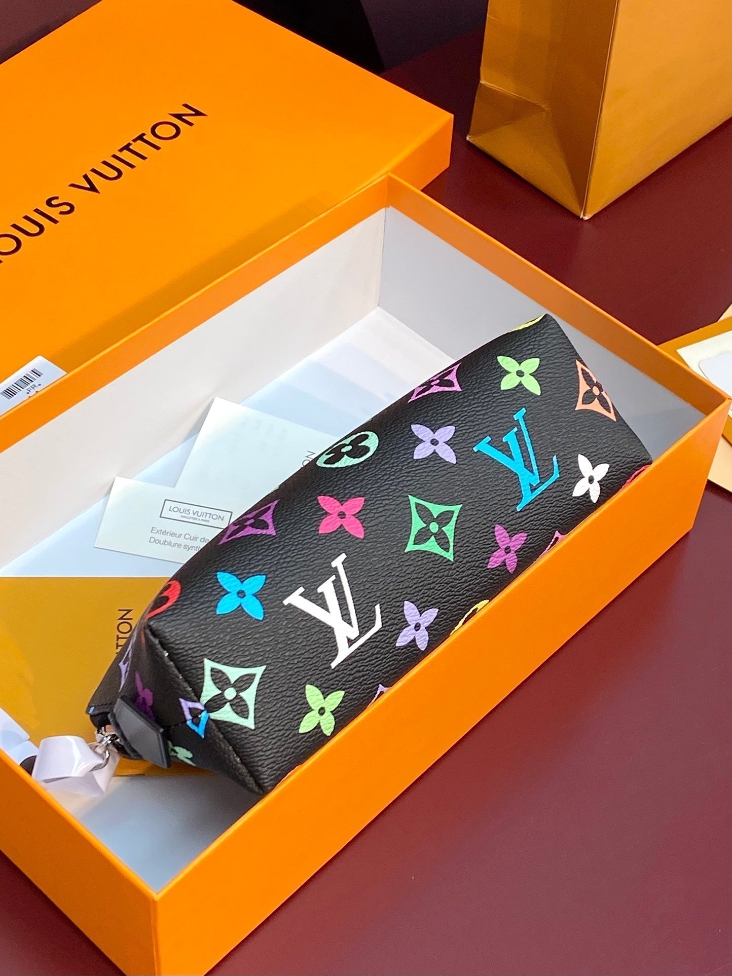 Kosmetiktasche PM 19 aus farbenfrohem Monogramm-Canvas