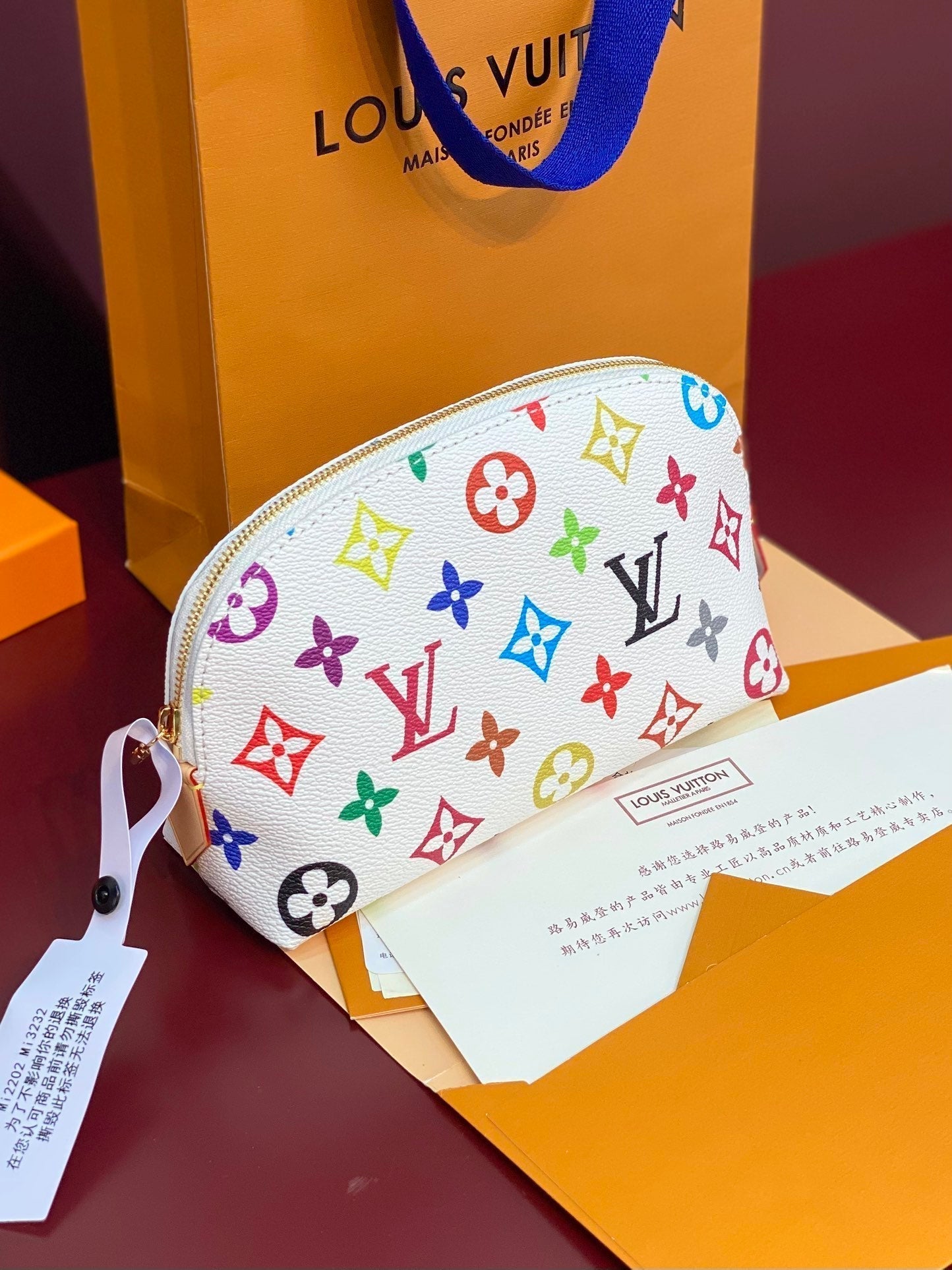 Kosmetiktasche PM 19 aus mehrfarbigem Monogramm-Canvas