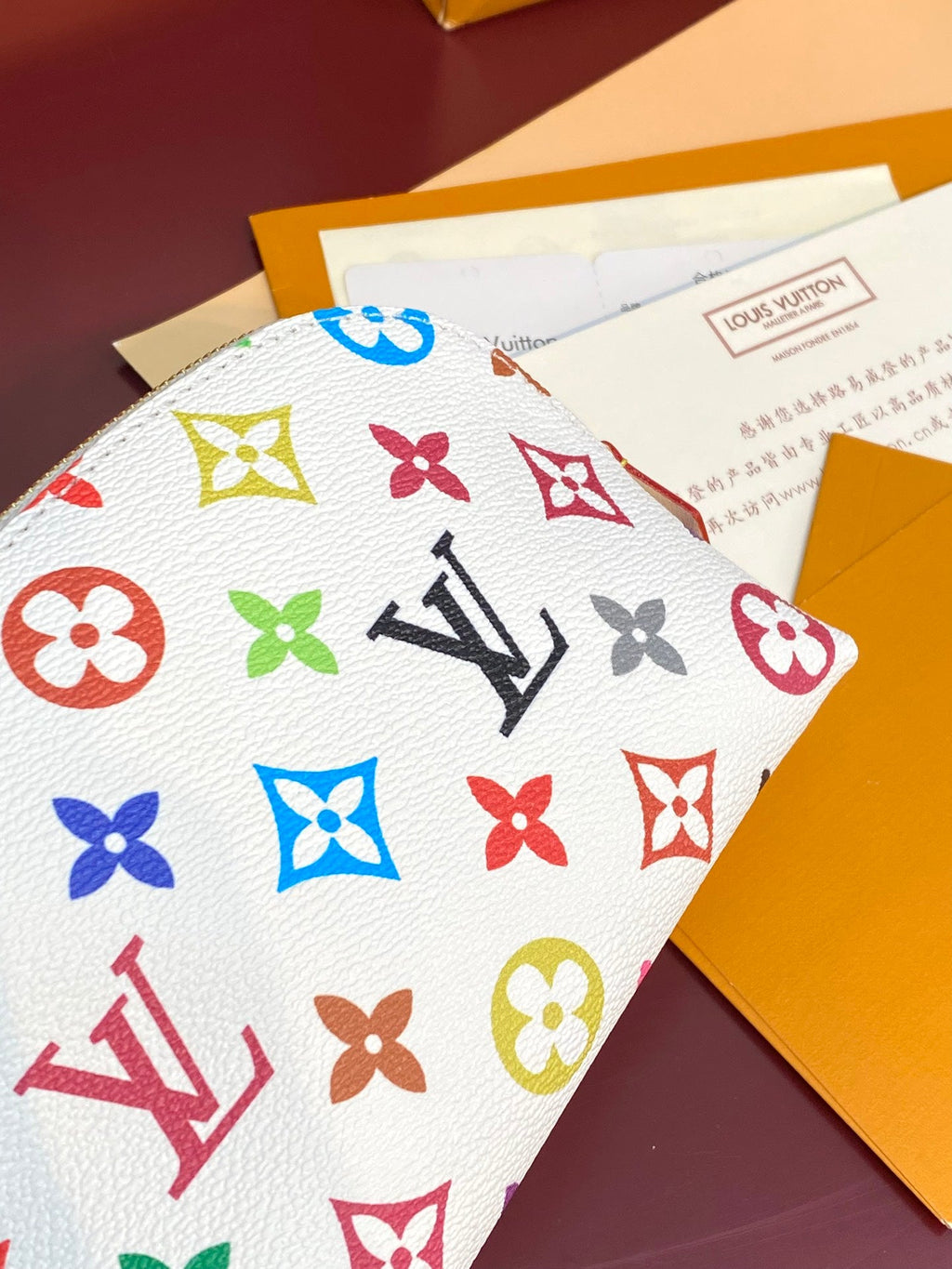 Kosmetiktasche PM 19 aus mehrfarbigem Monogramm-Canvas