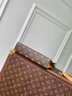 GASTON Tragbare Geldbörse 18 Zoll Braun Monogramm Canvas Mix Gelb Kalbsleder