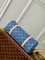 PAPILLON 27 IN BLAUEM MONOGRAMM-DENIM GOLDENE HARDWARE